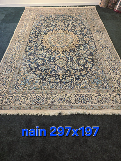Perzisch tapijt Nain 298x197 handgeknoopt wollen vloerkleed